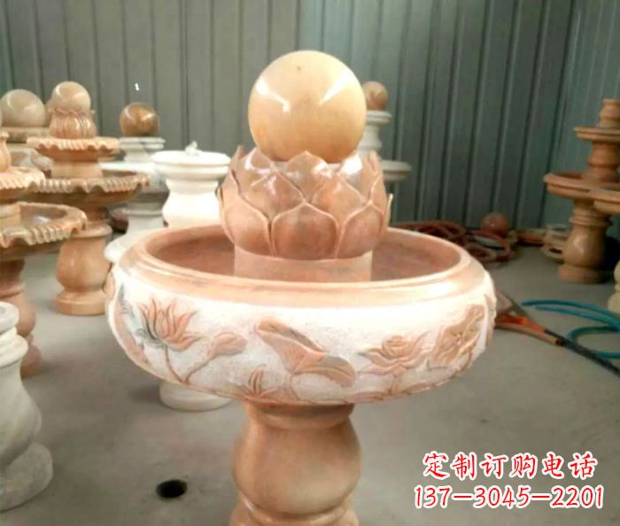 荆州石来运转晚霞红风水球喷泉石雕