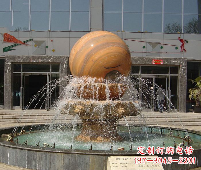 荆州石来运转球晚霞红风水球石雕