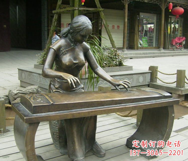 荆州铜雕现代人物弹古筝雕塑