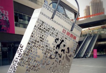 荆州购物袋雕塑-步行街室外锻造刻字不锈钢购物袋雕塑